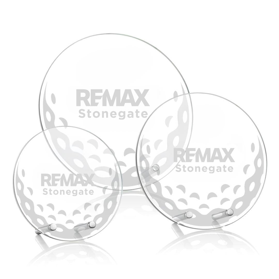 Three metallic decorative plates with 'REMAX Stonegate' branding on a white background