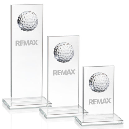 Three crystal golf ball awards with 'REMAX' branding on a white background