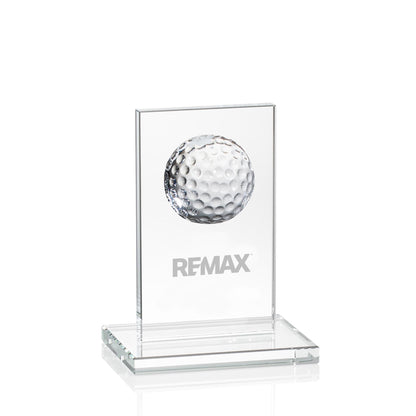 Golf ball in a clear display case with 'REMAX' branding on a white background