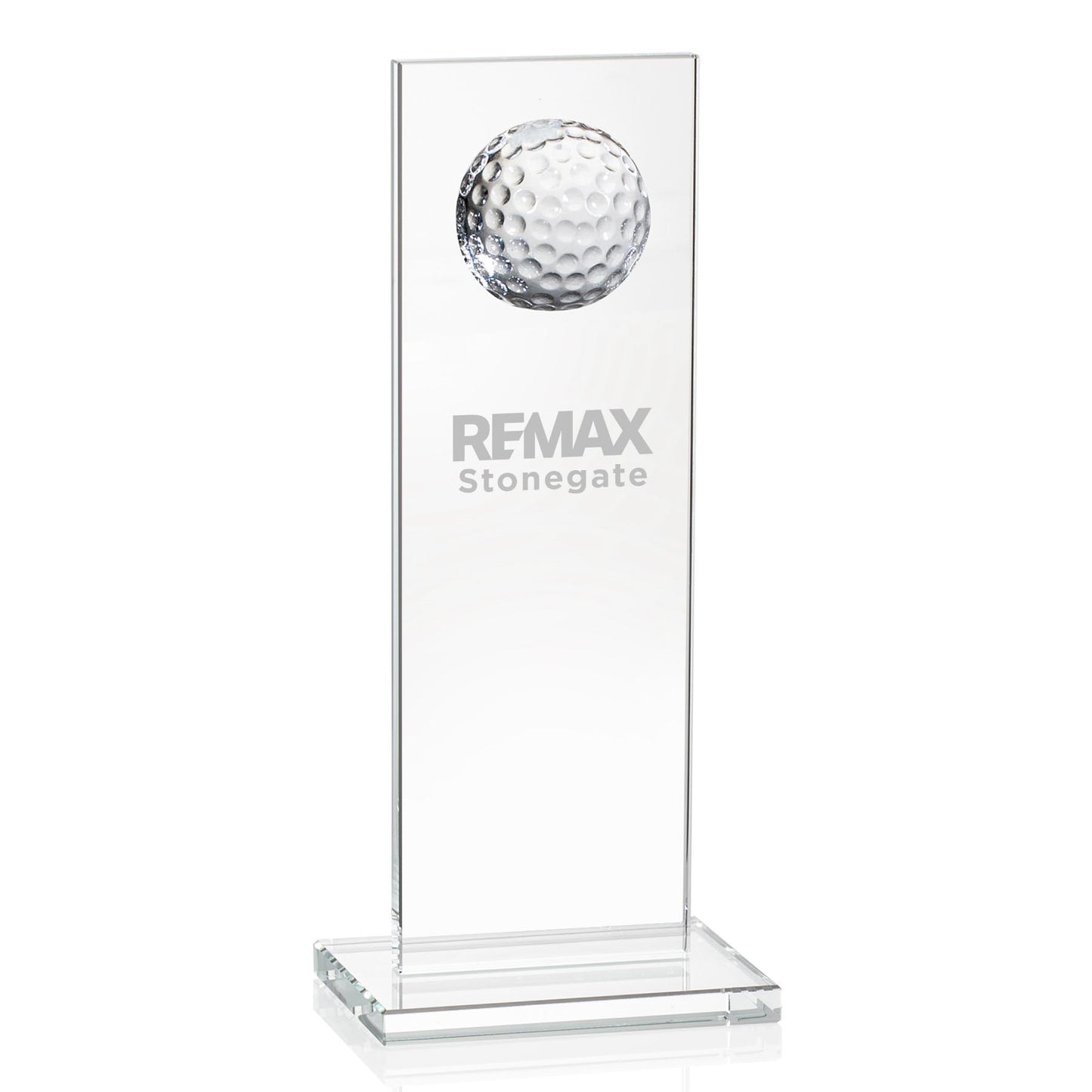 Clear glass trophy with golf ball design and REMAX Stonegate branding on a white background