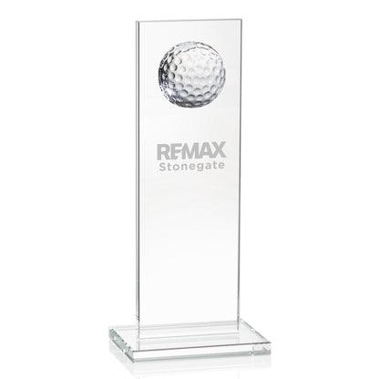 Clear glass trophy with golf ball design and REMAX Stonegate branding on a white background