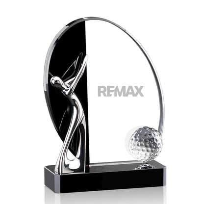 Crystal golf trophy with a golf ball and 'REMAX' branding on a white background