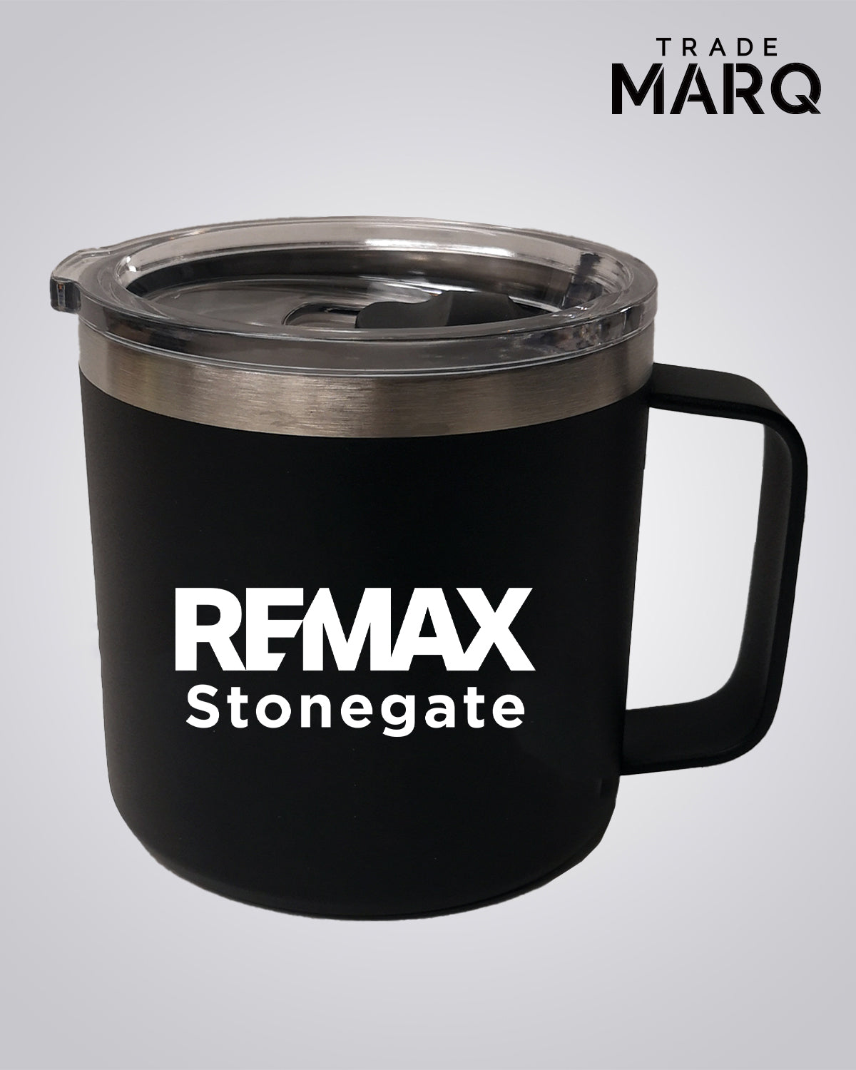 Black mug with 'REMAX Stonegate' branding on a gray background