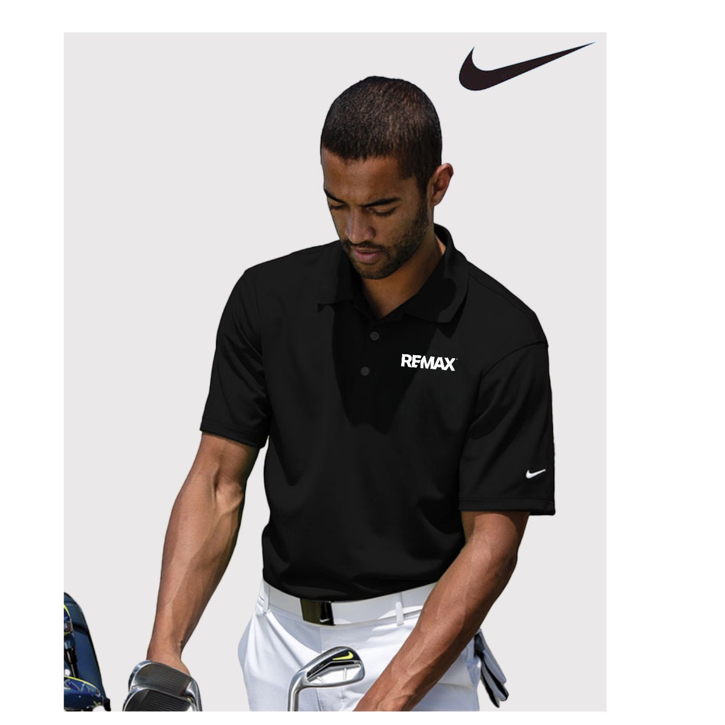 Man wearing a black polo shirt with 'REMAX' logo and Nike branding, holding golf clubs.