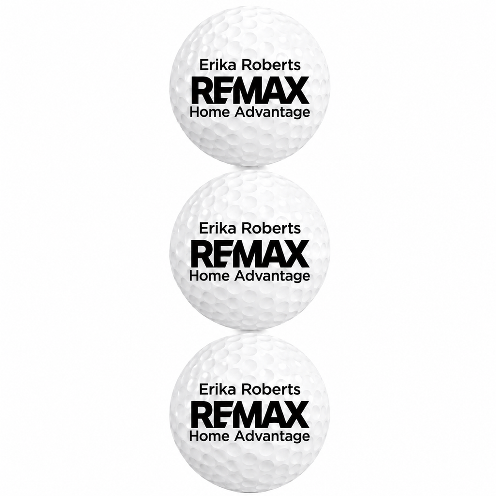Three golf balls with Erika Roberts REMAX Home Advantage branding on a white background