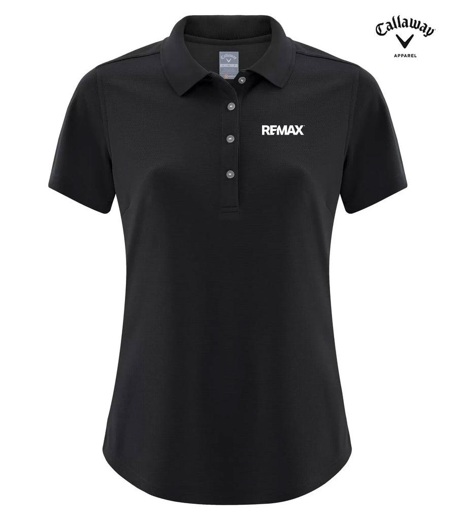 A black short-sleeve polo shirt with a three-button placket and a white REMAX logo on the left chest, shown on a plain white background with a Callaway Approved logo in the top right corner.
