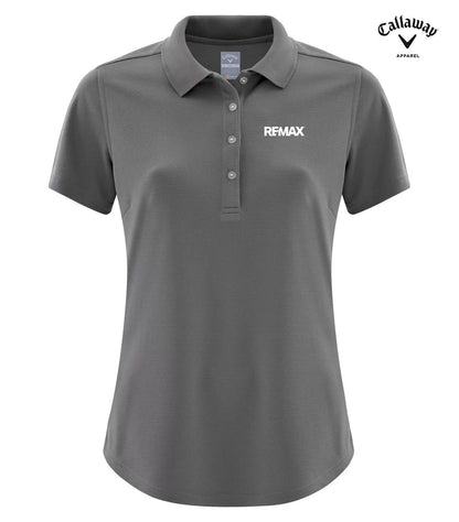 A dark gray short-sleeve polo shirt with a three-button placket and a white REMAX logo on the left chest, shown on a plain white background with a Callaway Approved logo in the top right corner.
