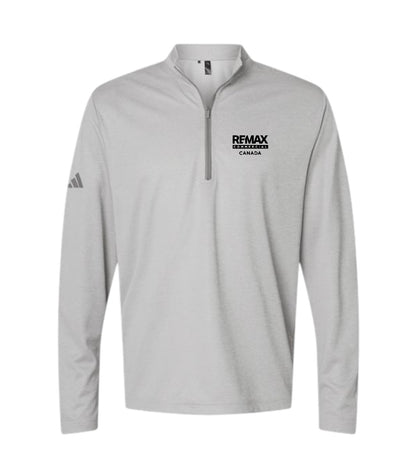 A light gray long-sleeve quarter-zip pullover with a black printed logo on the left chest reading 'REMAX BROKERS CANADA' and a black Adidas logo on the right sleeve, shown on a plain white background.