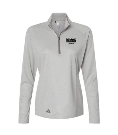 A light gray long-sleeve quarter-zip athletic pullover with a black 'REMAX REALESTATE CANADA' logo on the left chest and a small Adidas logo near the bottom hem, shown on a plain white background.