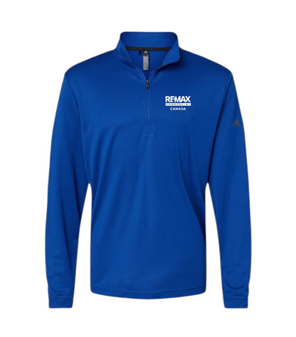 A royal blue long-sleeve quarter-zip pullover with a white 'REMAX BREAKING TROPHY CANADA' logo printed on the left chest and a small gold Adidas logo on the right sleeve, shown on a plain white background.