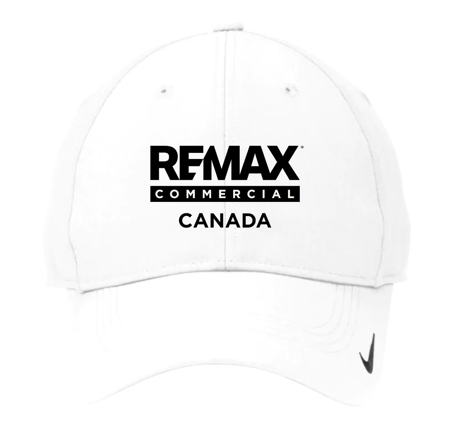 A white baseball cap featuring the black text 'REMAX COMMERCIAL CANADA' printed on the front, with a small black swoosh logo on the brim.