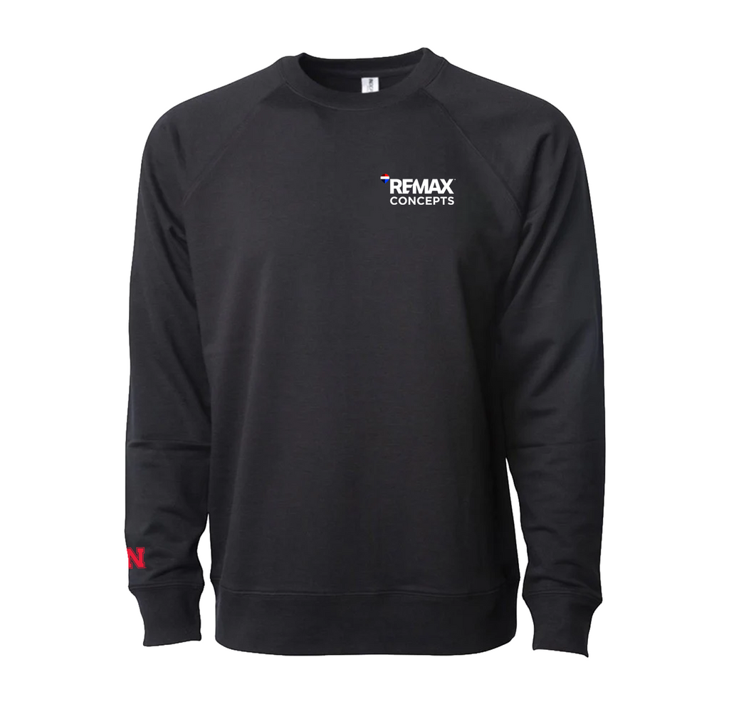 A black long-sleeve crewneck sweatshirt with 'REMAX CONCEPTS' printed in white on the left chest, featuring a small red and blue accent in the logo and a red 'W' on the right sleeve cuff, shown against a plain white background.