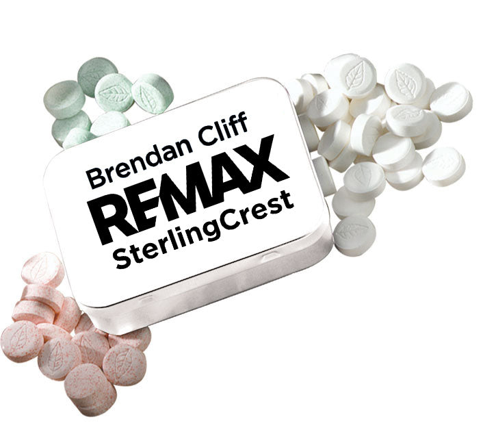 REMAX SterlingCrest logo on a small white box with colorful pills around it.